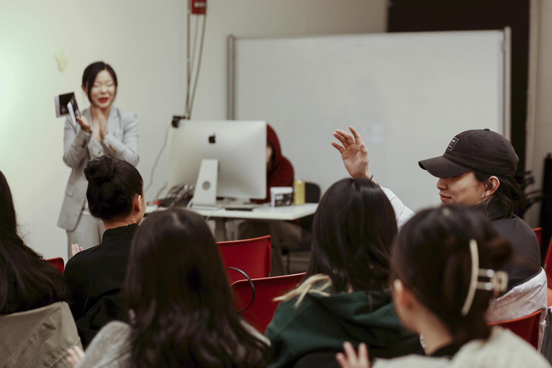 Professor Snow Fu interacts with students